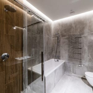 New, clean bathroom with shower and bathtub