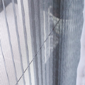 Background with mosquito netting screen against wire mosquitoes